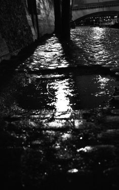 Luc Dartois 2008 - Paris by night under the rain, paving stones on the Banks of Seine