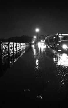 Luc Dartois 2019 - Paris by night under the rain, Mirabeau Bridge